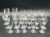 a lot of empty wine glasses on the table