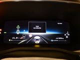 an image of a car ' s dashboard with a digital display