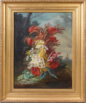 painting of a bouquet of flowers in a gold frame on a wall