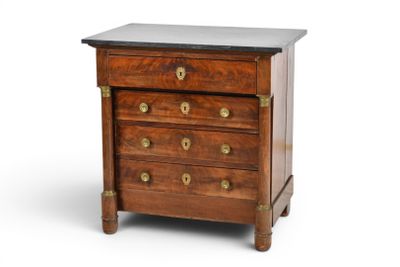 an image of a wooden chest of drawers with a marble top