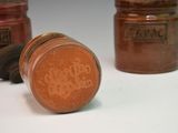 two jars of food that are next to each other