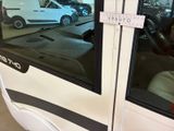 a small car that is parked in a garage