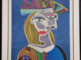 un tableau représentant une femme coiffée d'un chapeau