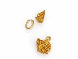 a pair of gold earrings and a gold earring on a white background