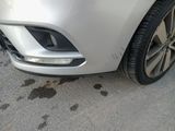 a close up of a car ' s front bumper