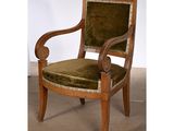 an image of a wooden chair with a green velvet upholstered seat