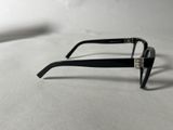 a pair of glasses that are laying on a table