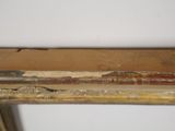 a close up of a picture of a window with peeling paint