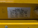 a close up of a label on the back of a yellow truck