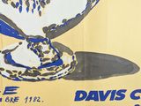a poster with a picture of a blue and white vase on it
