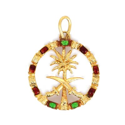 une image représentant un pendentif plaqué or avec un palmier au centre