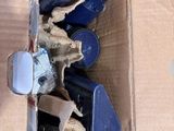 a cardboard box with a bunch of items inside of it