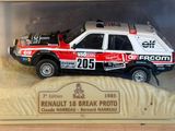 a toy car in a display case on a table