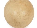 a ball that is sitting on a white surface