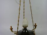 a black and gold chandelier hanging from a ceiling
