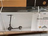 a box with a scooter on it sitting on a pallet