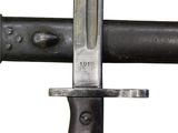 a close up of a knife on a metal pole