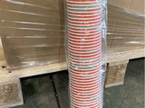 a stack of red and white cups sitting on a pallet