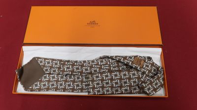 an orange box containing a pair of socks and a pair of gloves