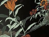 a picture of a vase with flowers in it