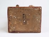 a small wooden box with a cross on it