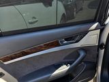 a car door with the door handle open and the driver ' s side door open