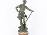 an image of a statue of a man holding a spear