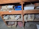 many boxes and boxes on the shelves in the room
