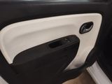 the door handle of a car with a black and white door handle