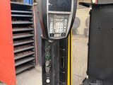 an image of a machine that is in a warehouse