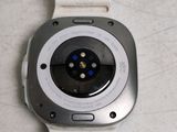 a close up of a smart watch on a table
