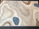 a picture of a rug that is on a table
