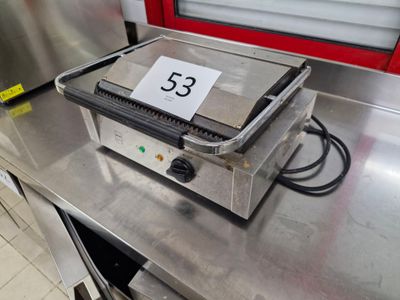 a machine that has a number on it sitting on a counter