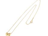 a gold plated necklace with a heart pendant on a chain