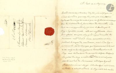an old book with a red wax seal on it