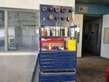 an image of a garage with tools on a cart