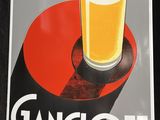a sign with a glass of beer on top of it