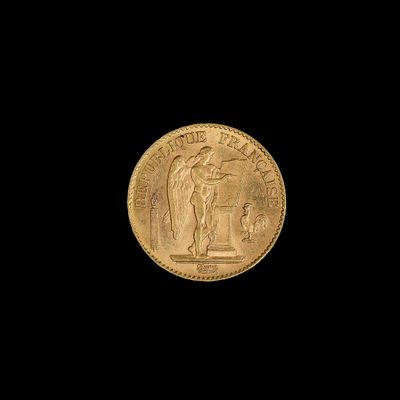 une pièce d'or sur fond noir