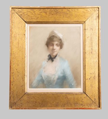 an old picture of a woman in a blue dress in a gold frame