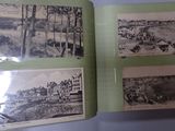 a person holding an open book with pictures on it