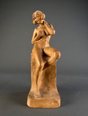 an image of a statue of a woman sitting on top of a wooden block