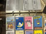 a suitcase full of children ' s books sitting on a table