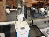 a machine that is sitting on a table in a room