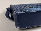 navy blue leather case with gold studded handles