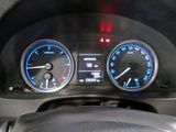 a close up of a car dashboard with a speedometer and gauges