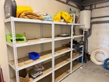 a room with a lot of shelvings in it