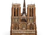 a wooden model of a cathedral with a clock on it