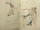 an open book with a drawing of a person on a skateboard