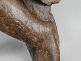 a statue of a bear that is sitting on top of a table