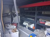 an image of the inside of a van with many items in it
